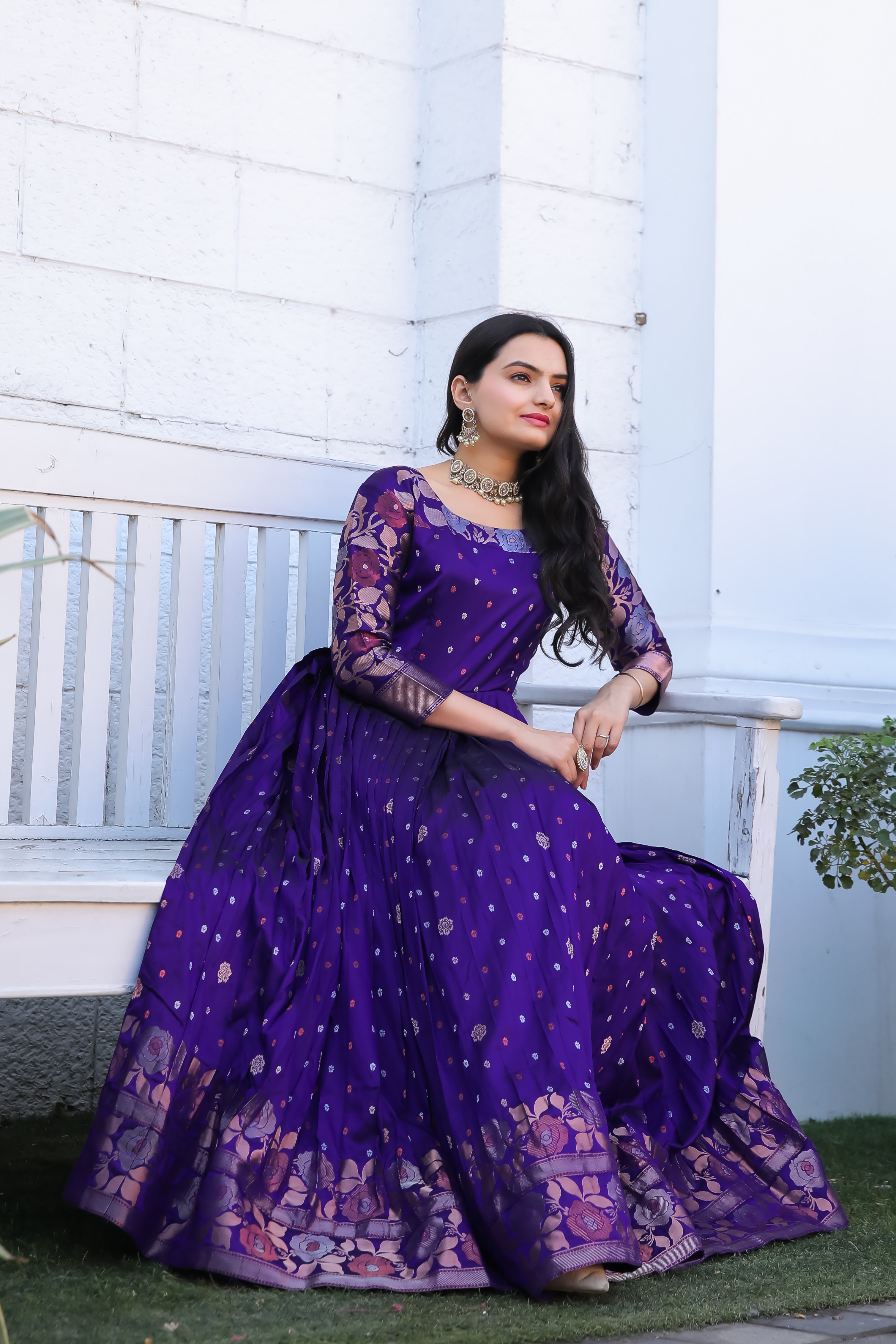 Violet Soft Silk Flared Gown with All-Over Copper Zari Weaving Buttis & Rich Floral Border