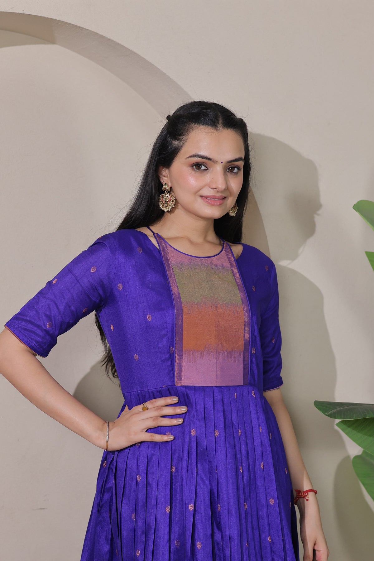 Royal Purple Woven Silk Flared Gown with Multi-Color Zari Border & Yoke Panel