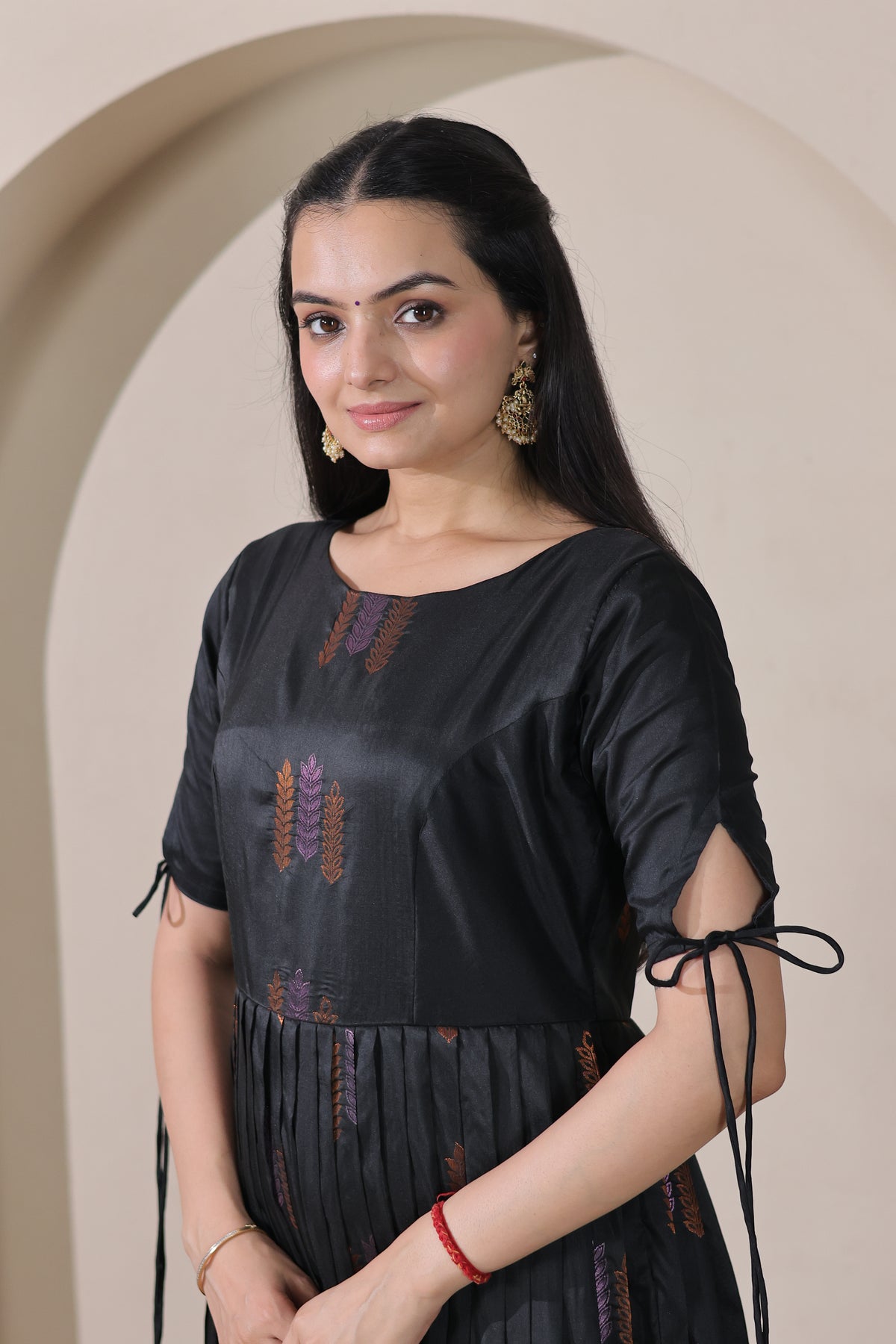 Black Woven Silk Flared Gown with Contrast Maroon Border & Elegant Tie-Up Sleeves