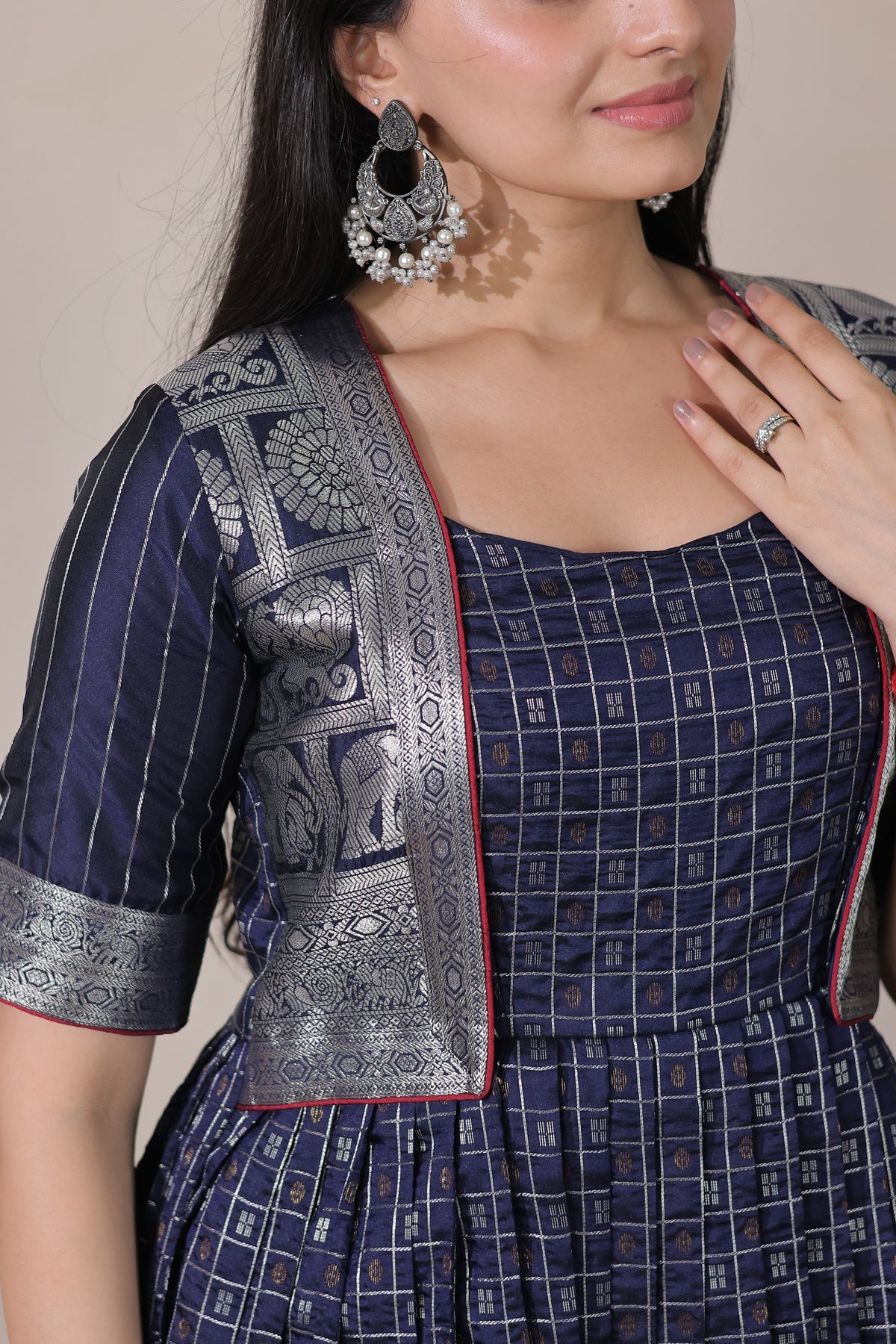 Navy Blue Woven Silk Flared Gown with Attached Brocade Jacket Look & Rich Silver Zari Woven Border