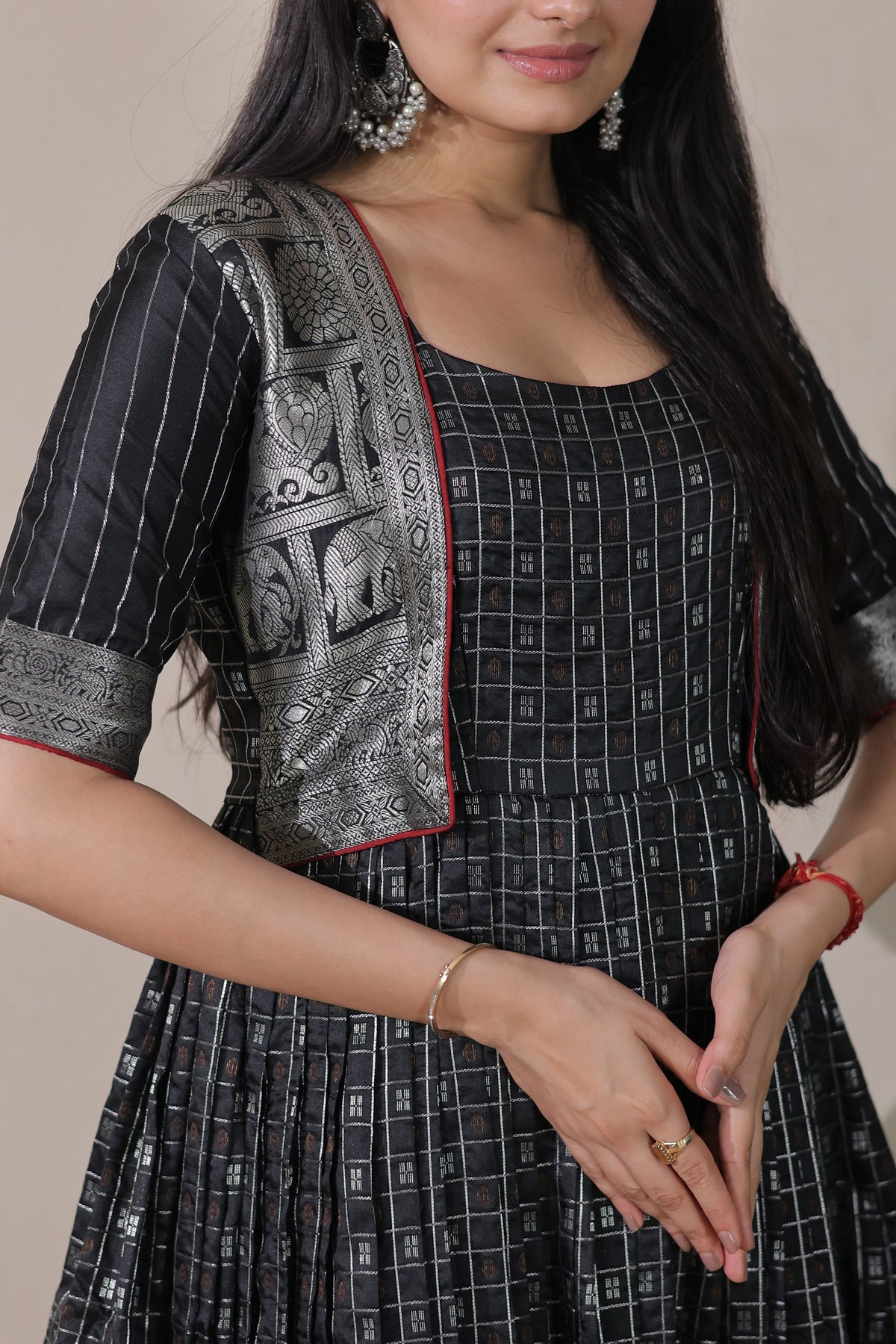 Black Woven Silk Flared Gown with Attached Brocade Jacket Look & Rich Silver Zari Woven Border