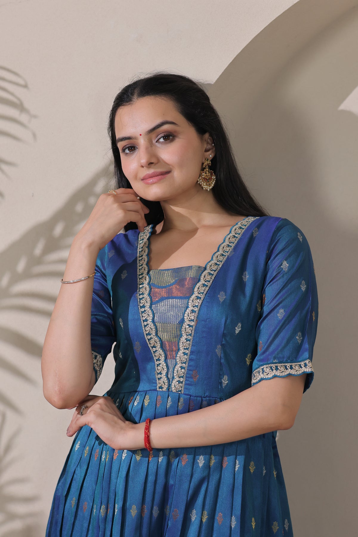 Peacock Blue Silk Blend Woven Butti Gown with Delicate Embroidered Lace Neckline