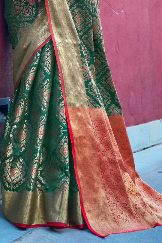Green Colored Festive Wear Patola Woven Silk Saree