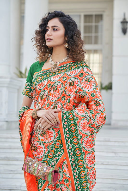 Orange Color Patola Designer Zari Work Party Wear Saree