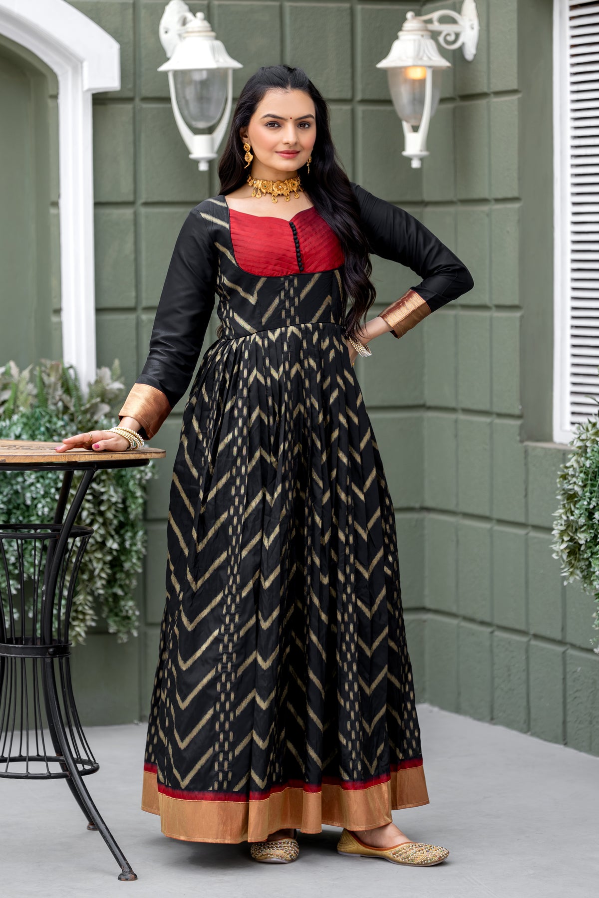 Soft Silk Chic Black Zari-Woven Chevron Gown with Red Yoke & Zari Border Panel