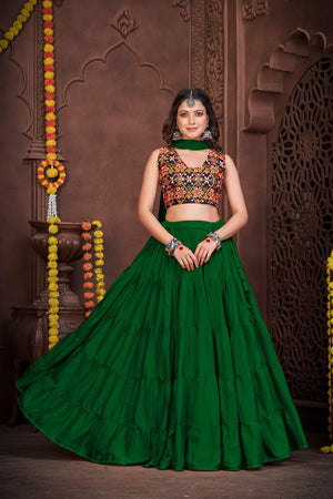 Dark Green French Crape Navratri Lehenga Choli with multi-color Kutchi embroidery and mirror work blouse by The Beauty Queen