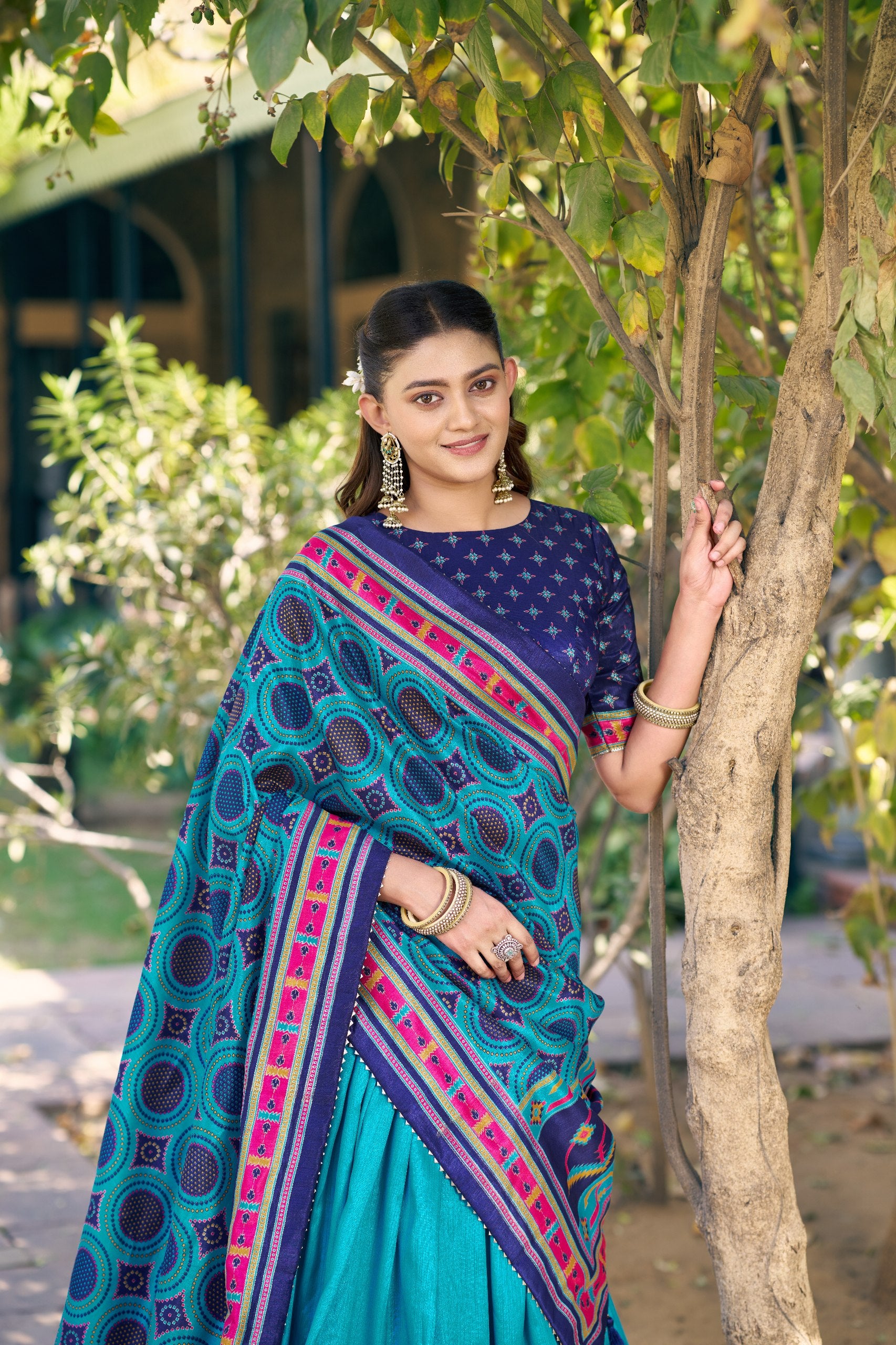 Rama Blue & Navy Blue Tasar Silk Navratri Lehenga Choli with Iconic Sparkle & Printed Work
