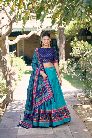 Rama Blue and Navy Blue Tasar Silk Navratri Lehenga Choli featuring iconic sparkle and peacock printed work by The Beauty Queen