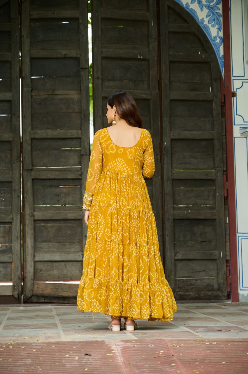 Yellow Bandhani Print Work With Kutchi Patchework Navratri Gown