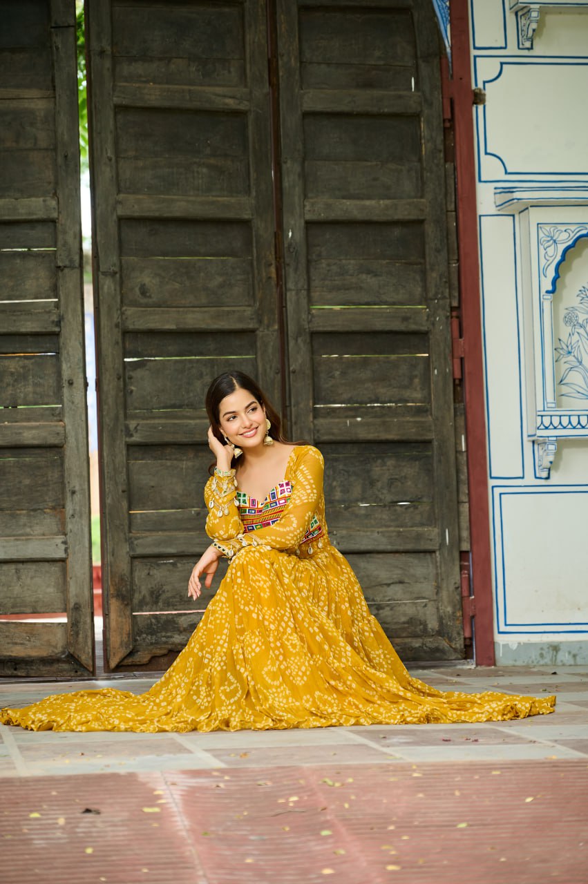 Yellow Bandhani Print Work With Kutchi Patchework Navratri Gown