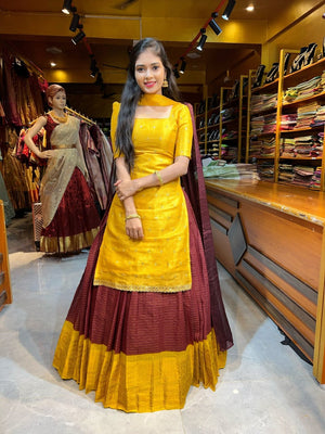 Yellow Kanchi cotton kurta with maroon zari border lehenga