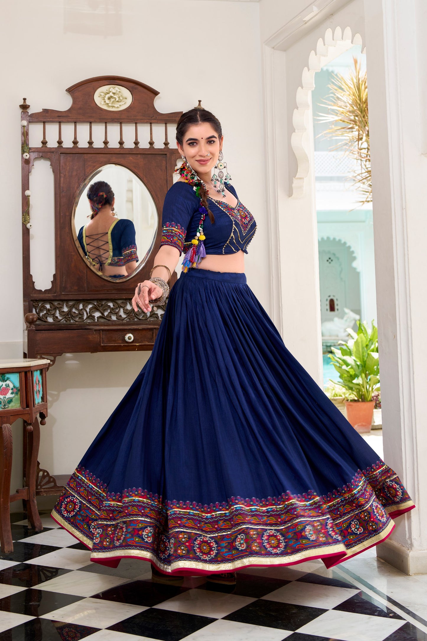 Navy Blue Tasar Silk Gamthi Print With Embossed Design Work Navratri Lehenga Choli