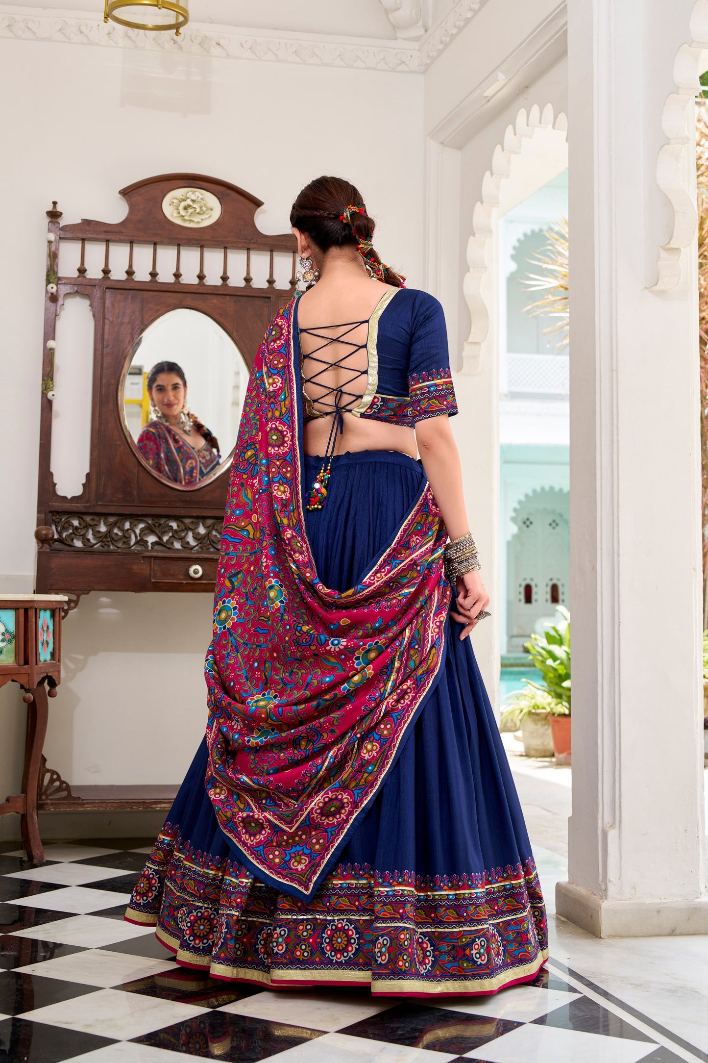 Navy Blue Tasar Silk Gamthi Print With Embossed Design Work Navratri Lehenga Choli