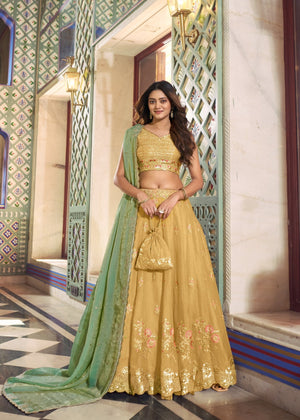 Mustard yellow lehenga choli moss silk sequins embroidery