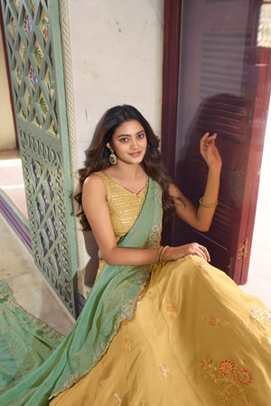 Chartreuse lehenga with contrast sage green dupatta