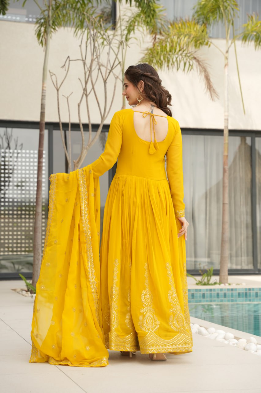 Yellow Faux Blooming With Embroidery Zari Sequins Work Gown