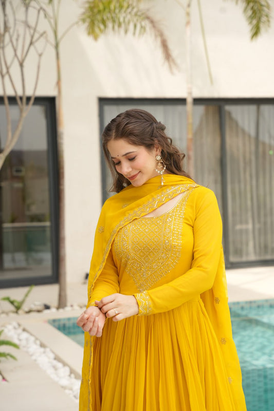 Yellow Faux Blooming With Embroidery Zari Sequins Work Gown