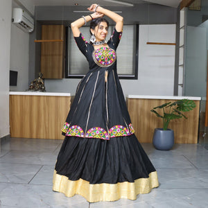Modern Navratri lehenga black with traditional embroidery and zari trim