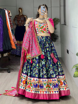 Traditional Gujarati garba lehenga with vibrant Kutchi embroidery blue pink