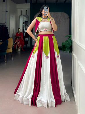 Modern Navratri lehenga with pearl and cowrie shell tassel cape