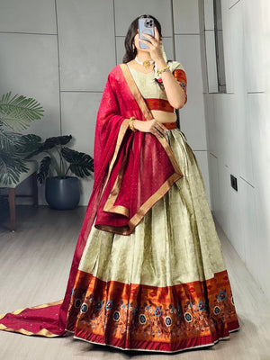 Sage green silk lehenga with contrast red Paithani woven border