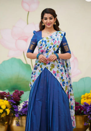 Blue South Indian half saree with temple patta border and off-white floral dupatta