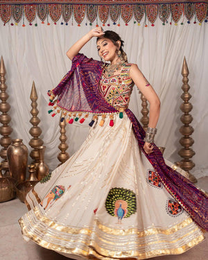 Garba chaniya choli cream with Kutchi mirror work blouse and purple bandhani dupatta