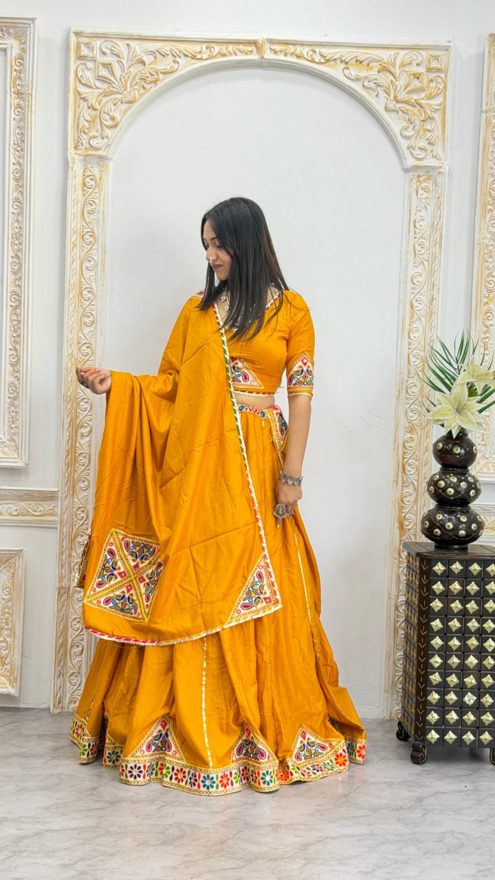 Garba chaniya choli mustard yellow with traditional mirror work border and dupatta
