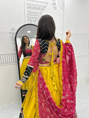 Traditional Gujarati Navratri chaniya choli yellow with mirror thread work for garba