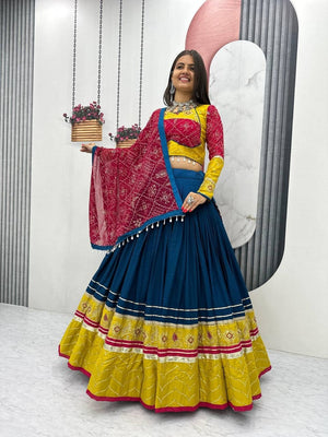 Teal blue and yellow rayon cotton Navratri chaniya choli with mirror and thread work and bandhani dupatta