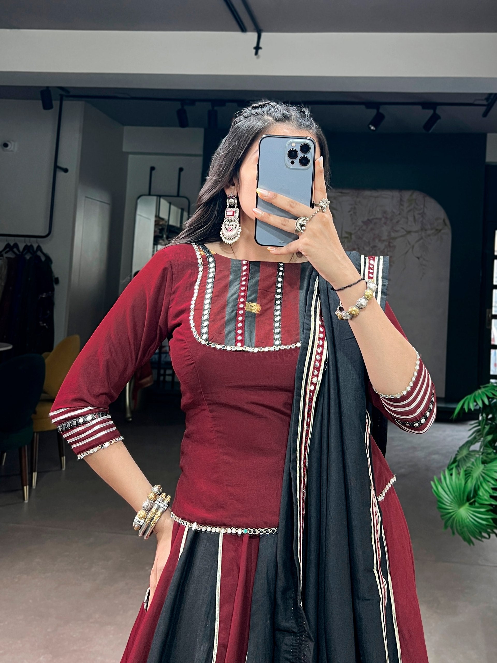 Maroon & Black Chinon Fabric Kali Panel Lehenga Enhanced With Embossed Designer Zari Border & Real Mirror Lace Detailing Navratri Chaniya Choli Set