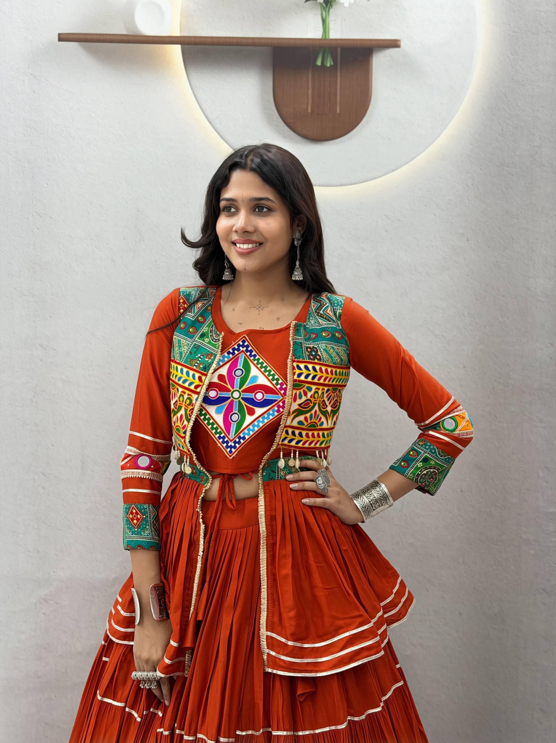 Rust Orange Pure Cotton Heavy Gamthi Work, Mirror Lace & Sikka Lace Navratri Lehenga Choli Set with Koti Jacket | Ready to Wear