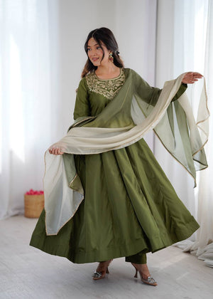 Olive Green Pure Soft Heavy French Crape Kalicut Anarkali Suit with gold embroidery and shaded dupatta by The Beauty Queen Surat.