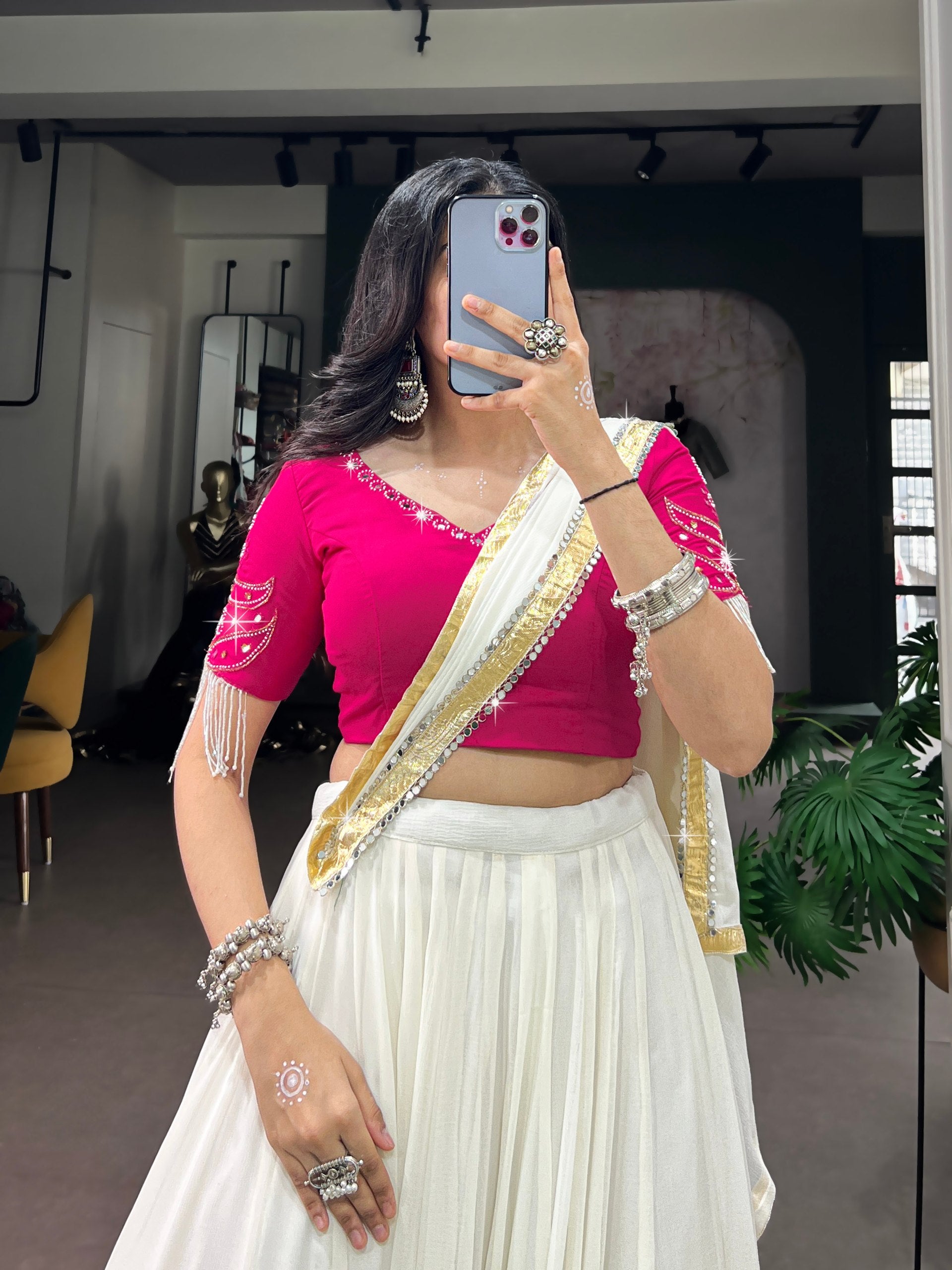 Off-White & Rani Pink Lightweight Georgette Fabric With Embossed Zari Border & Real Mirror Work Navratri Chaniya Choli Set