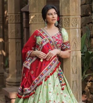 Garba chaniya choli pista green with gold digital print and red mirror work blouse