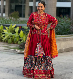 Traditional Gujarati Navratri lehenga choli maroon with embroidered jacket for garba