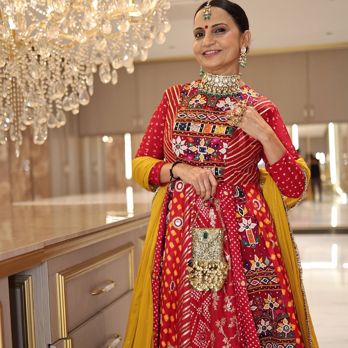 Garba lehenga choli red bandhani print with Kutchi mirror embroidery and yellow dupatta