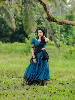 Modern South Indian half saree lehenga teal with black contrast