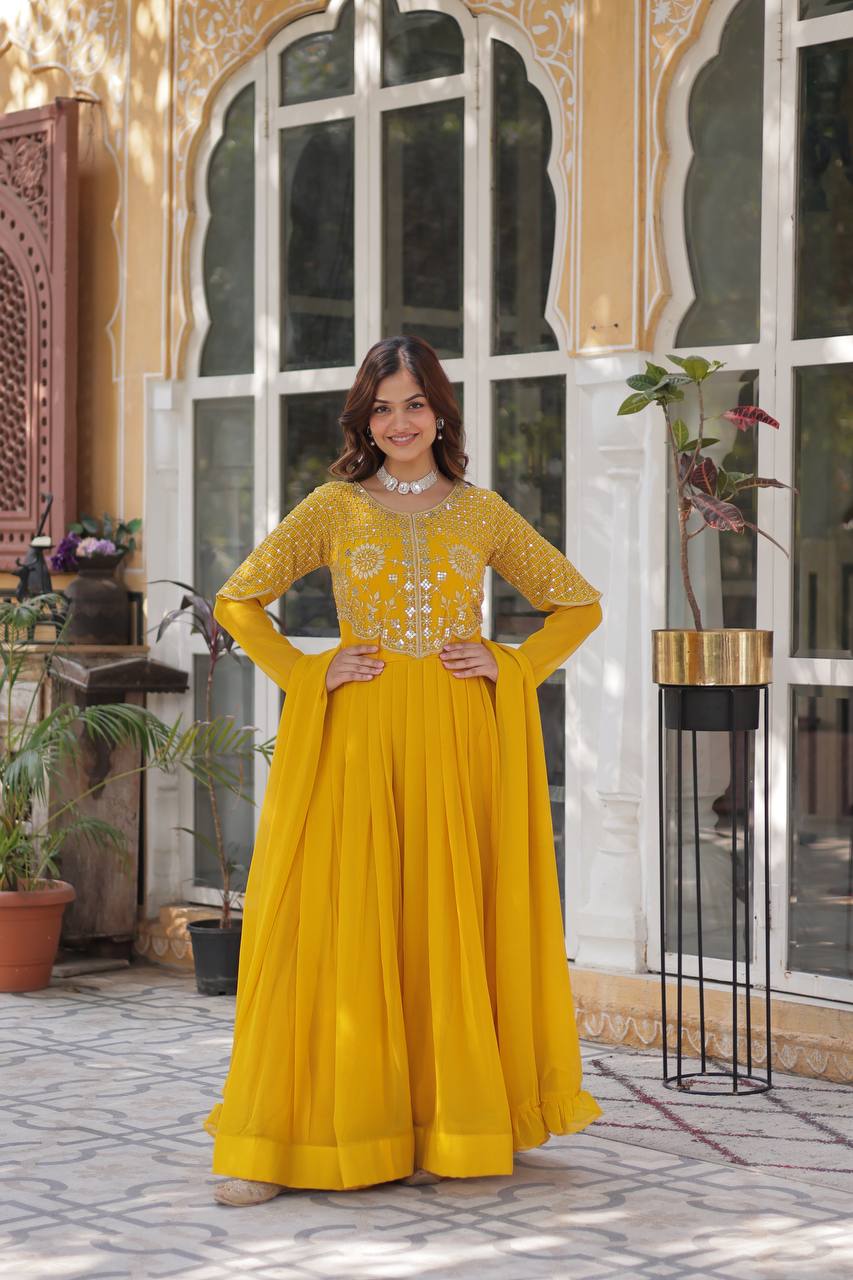 Yellow Faux Blooming Georgette With Attractive Embroidered Pearl Work Gown