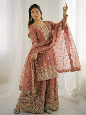 Peach Jimmy Silk Plazzo Set with Shimmering Sequence and Embroidery Work Full Sleeves by The Beauty Queen Surat