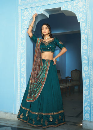 Teal Blue Vichitra Silk Lehenga Choli with Sequins and Gold Thread Embroidery Work by The Beauty Queen Surat