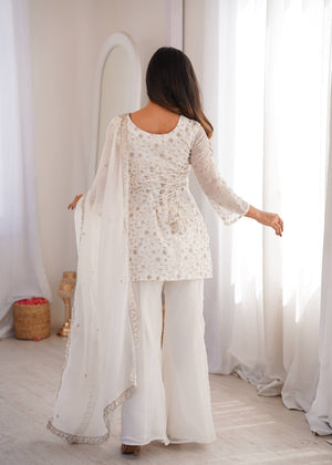 gold jari and sequence embroidery on white silk kurti