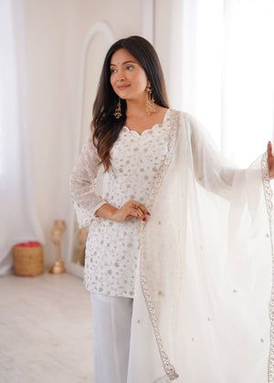 white sharara suit with sequence work and embroidered dupatta