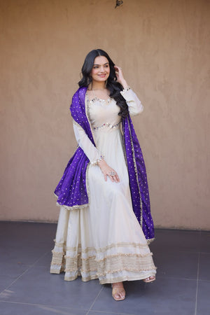 Off-White Cosmos Silk Anarkali Suit with real mirror work and zari embroidered lace by The Beauty Queen Surat.