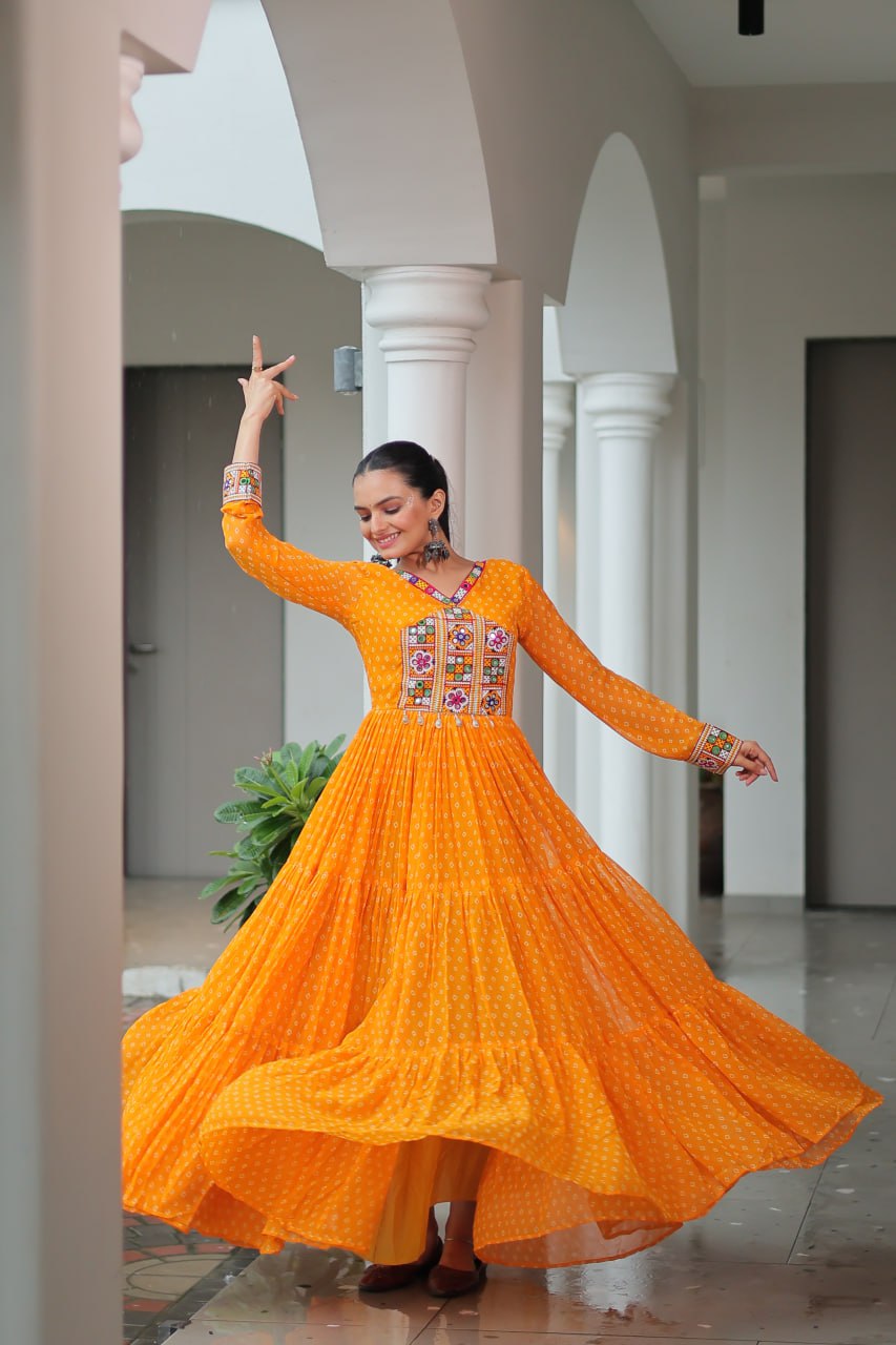 Yellow Bandhani Print Work With Kutchi Patchework Navratri Gown