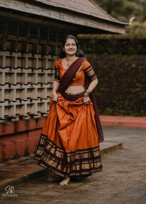 South Indian langa voni in burnt orange Kanchi cotton with maroon dupatta