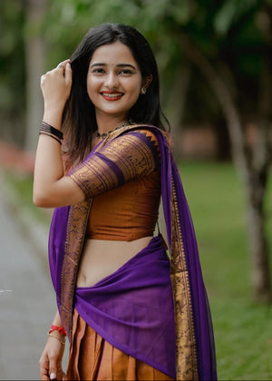 Traditional half saree with woven gold zari border rust purple