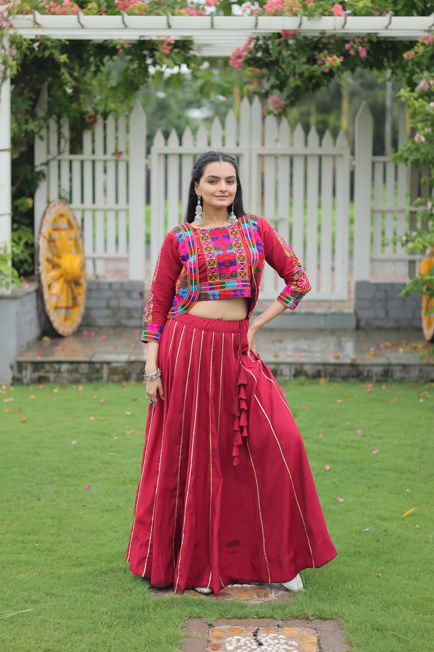 Maroon Roman Fabric With Kutchi Gamthi Embroidered Work Navratri Lehenga Choli