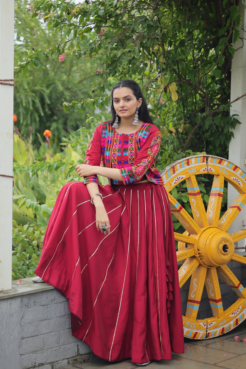 Maroon Roman Fabric With Kutchi Gamthi Embroidered Work Navratri Lehenga Choli