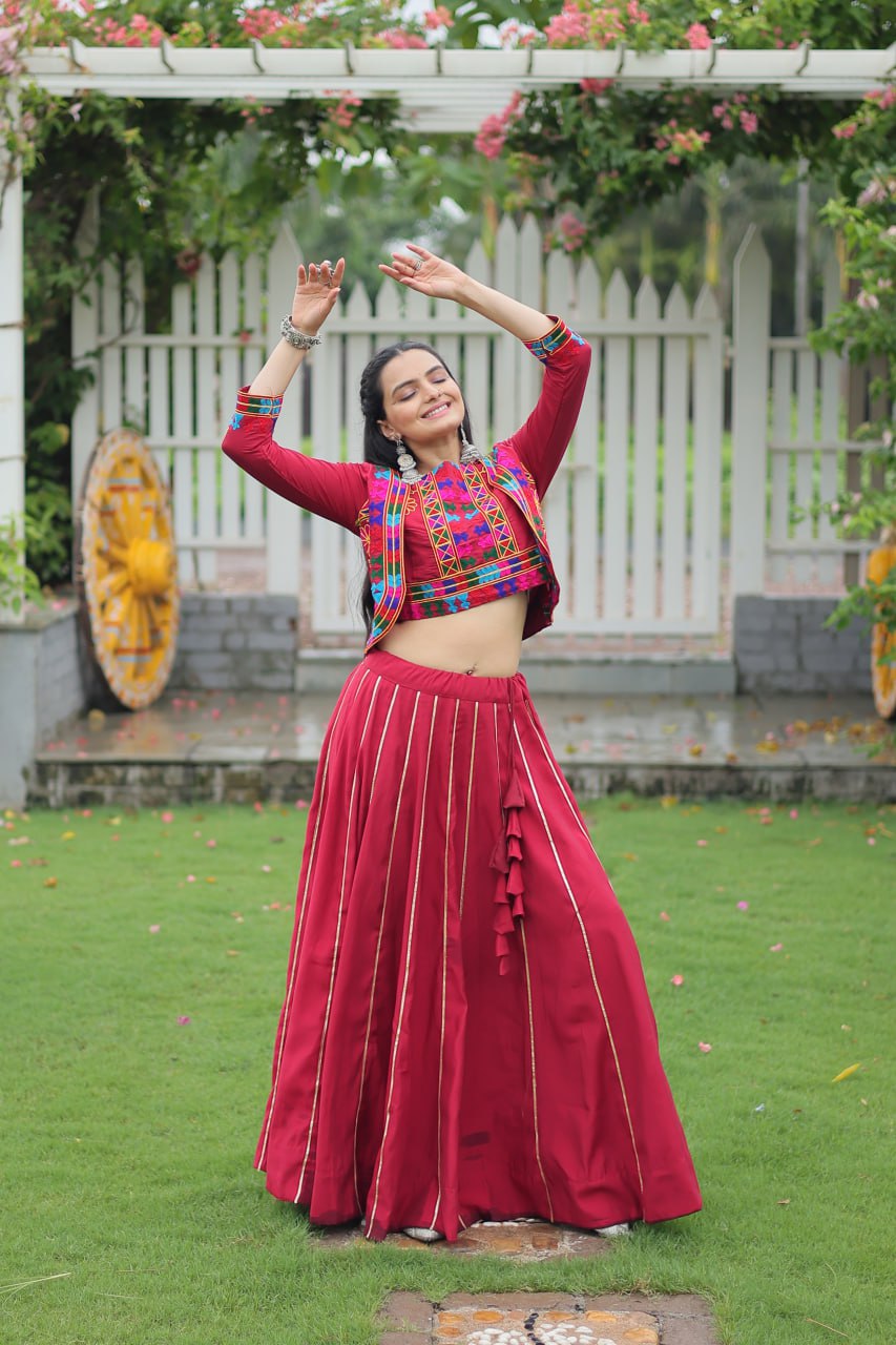 Maroon Roman Fabric With Kutchi Gamthi Embroidered Work Navratri Lehenga Choli